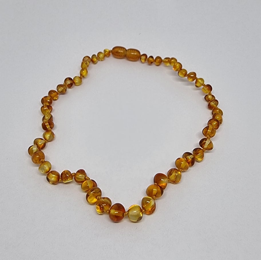 Child amber necklace - Honey